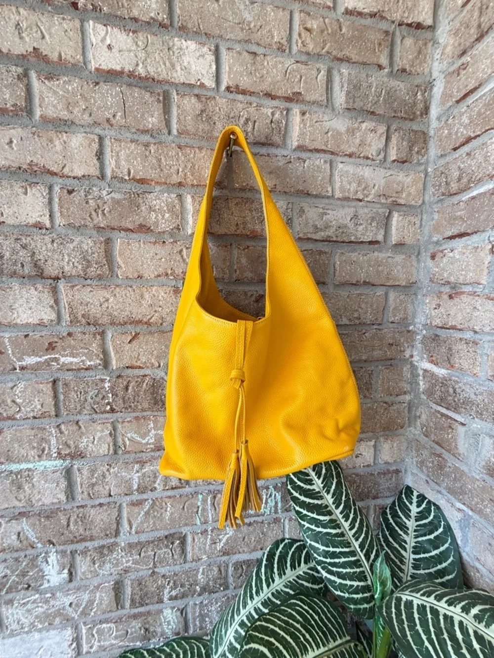 Laggo Havana hobo bag crafted from pebbled genuine leather.